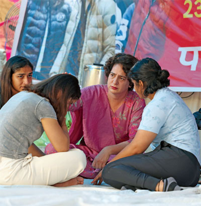 Congress leader Priyanka Gandhi Vadra with wrestlers Vinesh Phogat, Sakshi Malik and Sangita Phogat during their protest at Jantar Mantar