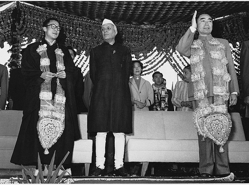 Prime Minister Jawaharlal Nehru flanked by the Dalai Lama and Chinese Prime Minister Zhou Enlai in 1956 in India