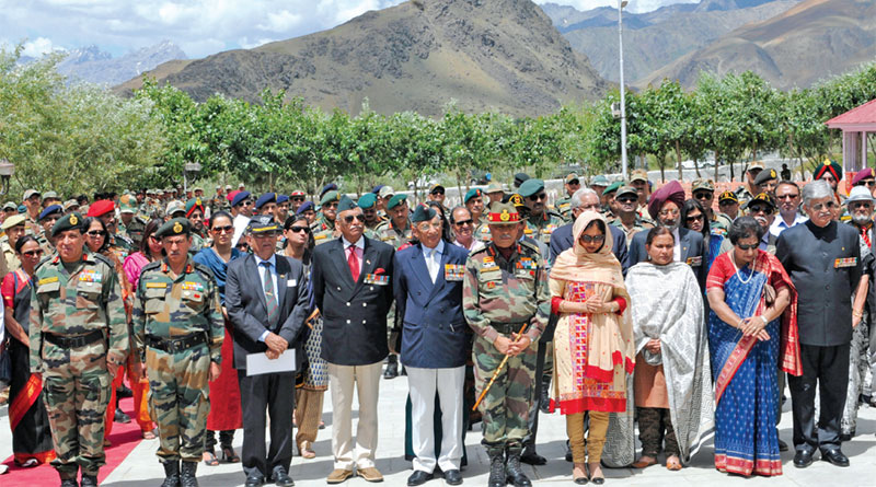 Officers, men and veterans commemorate Vijay Diwas at the Kargil War Memorial. Former army chief Gen.V.P. Malik is on extreme right accompanied by his wife