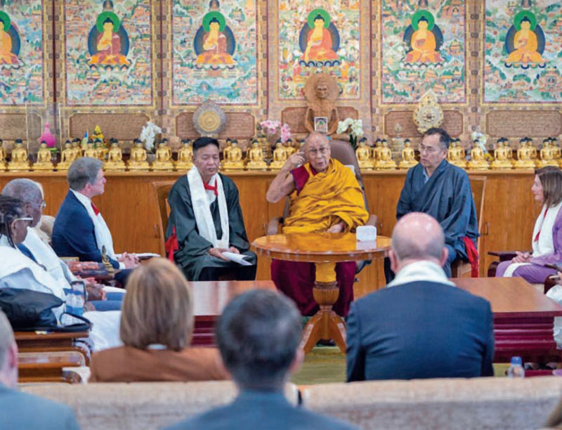 Michael McCaul and former House Speaker Nancy Pelosi met with Tibetan spiritual leader Dalai Lama in India