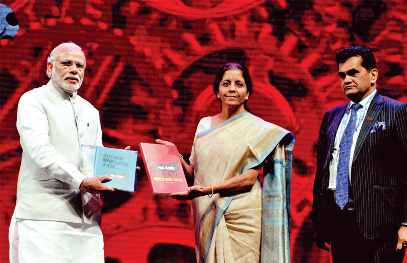 Prime Minister Narendra Modi with finance minister Nirmala Sithraman at the inauguration of the Make in India Week in Mumbai